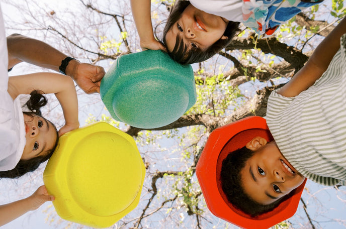 Children playing with Nuby StepPebbles.