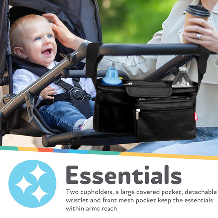 A smiling baby rides in a stroller as an adult uses the Nuby Deluxe Stroller Organizer with two cup holders and a large covered pocket on the handlebar, keeping bottles and essentials close. Text: “Essentials: Two cupholders, a large covered pocket...”.