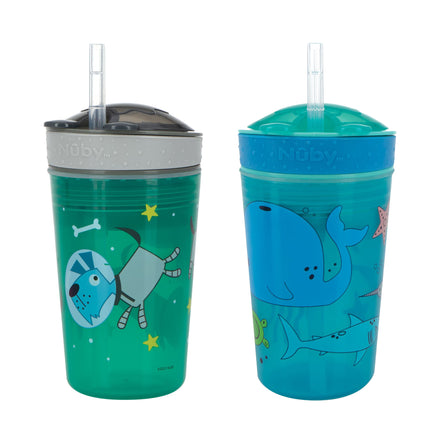 Set of two vibrant Snack ’N Sip Cups (2 Pack) | Space & Marine Life, each with a lid and soft silicone straw. One 2-in-1 cup displays a cheerful dog and stars design, while the other features marine life like whales and sharks. Both lids are branded with the Nuby name.