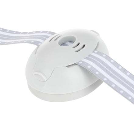 A close-up of a white plastic child safety lock with a gray and white striped strap, perfect for securing cabinets or drawers in homes using Soft Sounds Baby Earmuffs | Grey with an adjustable headband for hearing protection.