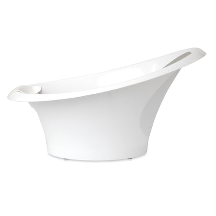 The Nuby Sit and Bathe Compact Bathtub, shown side-on against a plain white background, features smooth curves and a high backrest—designed for comfort and perfect for small spaces.