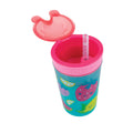 A vibrant Snack ’N Sip Cup (2 Pack) | Fruits & Butterflies designed for children, featuring a blue background decorated with fruit and butterfly illustrations—including strawberries and lemons—a pink flip-top lid, and a soft silicone straw visible with the lid open.
