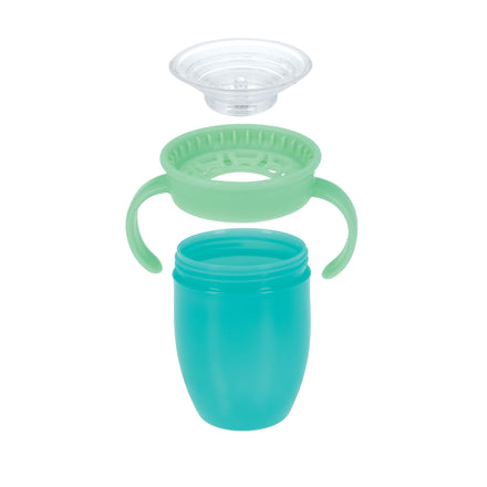 A Nuby 360 Wonder Cup with Handles (2 Pack - 5 oz) in pink/aqua is shown disassembled, highlighting its green lid, clear valve, and spill-proof cup.