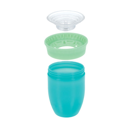The Nuby 360 Wonder Cup (2 Pack - 7 oz, Pink/Aqua) is shown with its parts separated: a pink plastic spoutless cup, an aqua sippy lid, and a clear cover—all aligned vertically to display the leak-resistant design.