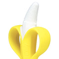 The NanaNubs Banana Massaging Toothbrush is a yellow baby teether shaped like a peeled banana, featuring a white textured silicone top and flexible yellow handles that resemble banana peels. Designed as a gentle baby toothbrush, it soothes gums and encourages healthy oral habits.