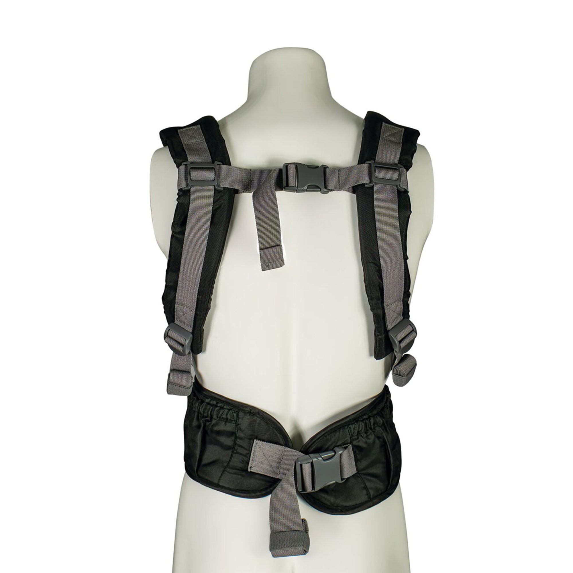A mannequin displays the Deluxe Baby Carrier | Black, featuring padded shoulder straps, adjustable straps, a chest buckle, and a lumbar-support waist belt, photographed from the back.