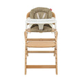 The Grow with Me Foldable High Chair is a wooden adjustable high chair featuring a beige cushion, safety harness, adjustable footrest, and a detachable white tray, designed for infants or toddlers.