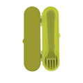 The Nuby Toddler Utensil Set | Dino includes a green plastic spork in a matching travel case. "Nuby" is printed on the handle, making it perfect for toddlers to self-feed while on the go.