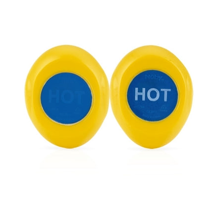 Two Nuby Hot Safe Bath Duck indicators are yellow ovals with blue centers and HOT in white, resembling bath ducks. Placed side by side on a white background, they help ensure your baby’s bath is at a safe temperature.