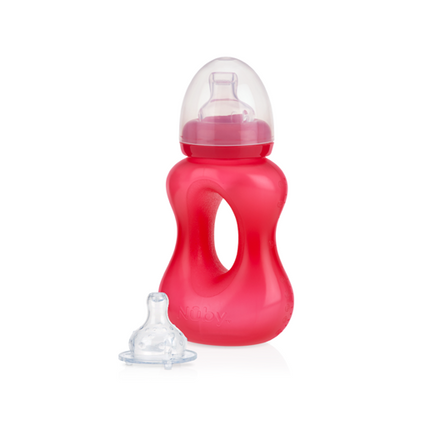 A red Nuby Lil Gripper 2-Stage Bottle to Cup with an ergonomic handle, clear cap over the nipple, and an extra clear silicone nipple beside it—all shown on a white background. Ideal for smooth bottle to cup transitions.